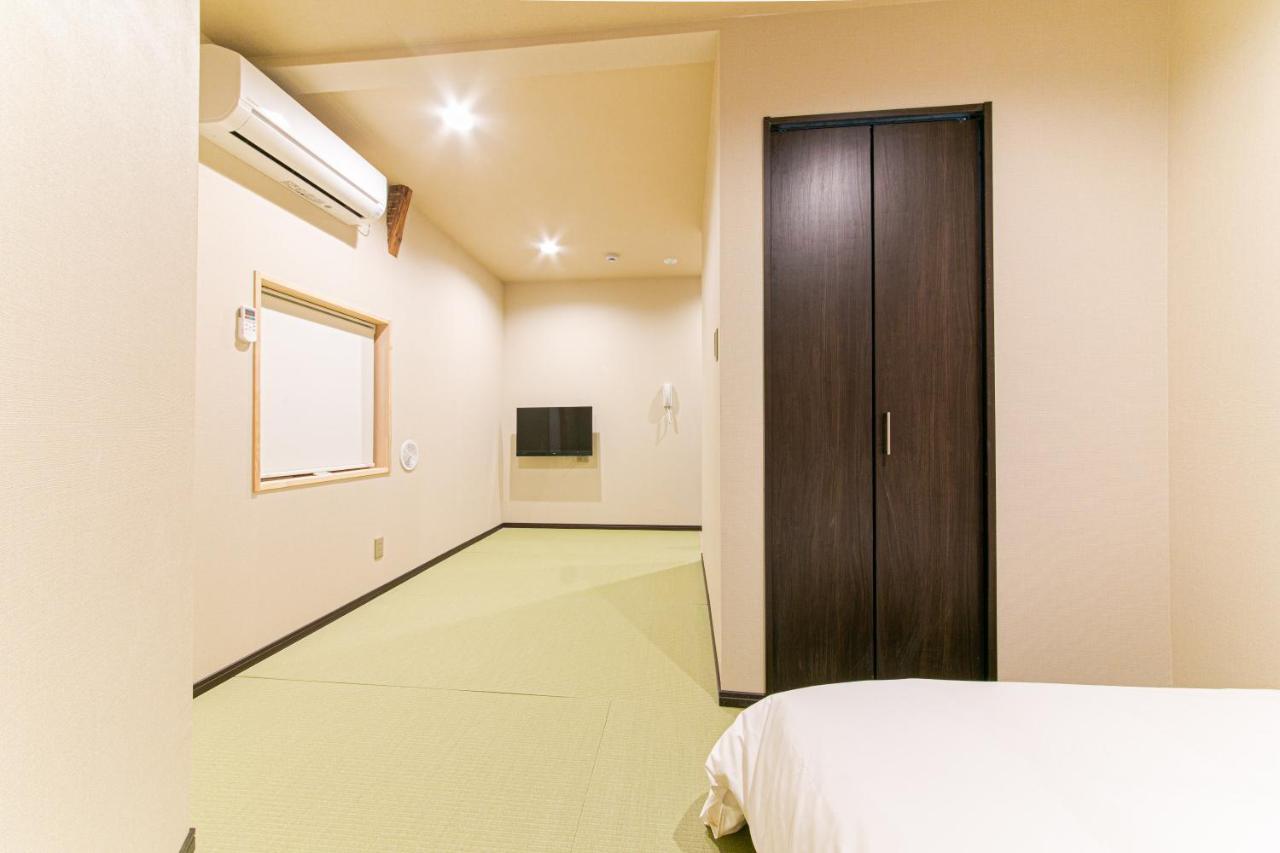 Chambre Triple avec Salle de Bains Privative