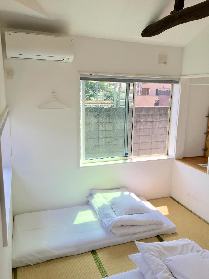 Chambre Triple avec Salle de Bains Commune